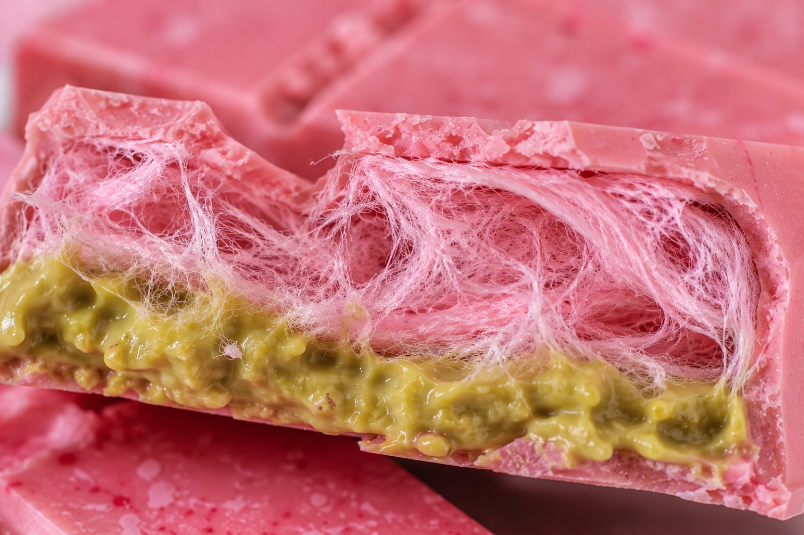 Finished homemade angel hair chocolate bar — viral pink chocolate recipe result with cotton candy and pistachio cream